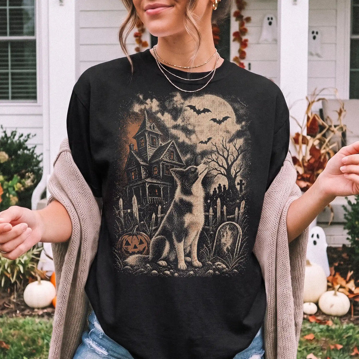 Model wearing a Black Comfort Colors® T-shirt showing Border Collie in a vintage haunted-house scene