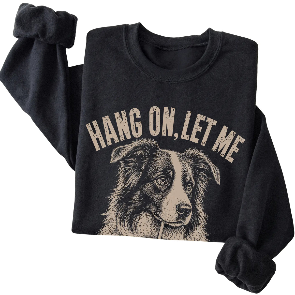 Black crewneck sweatshirt featuring Overthinking Border Collie, folded presentation