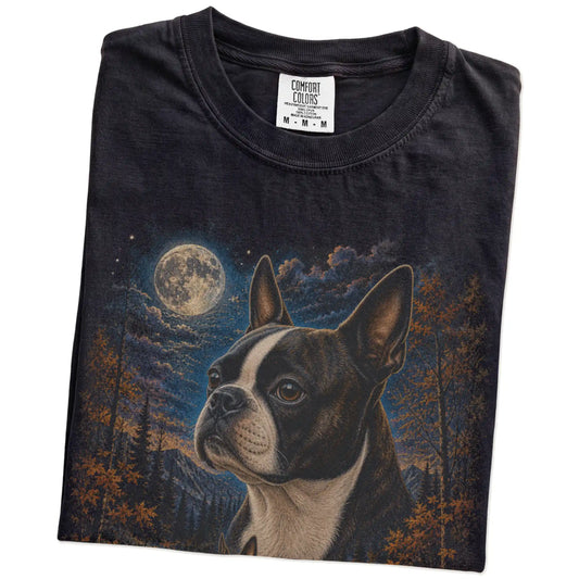 Folded black T-shirt with Boston Terrier Autumn Moon artwork.