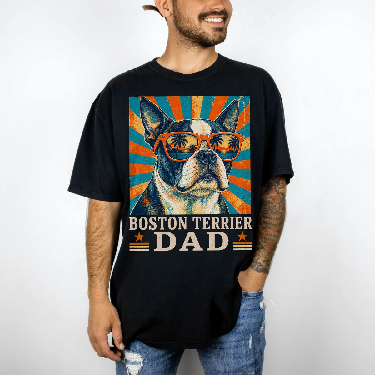 Retro Boston Terrier Dad design on a Black Comfort Colors T-shirt worn by a model
