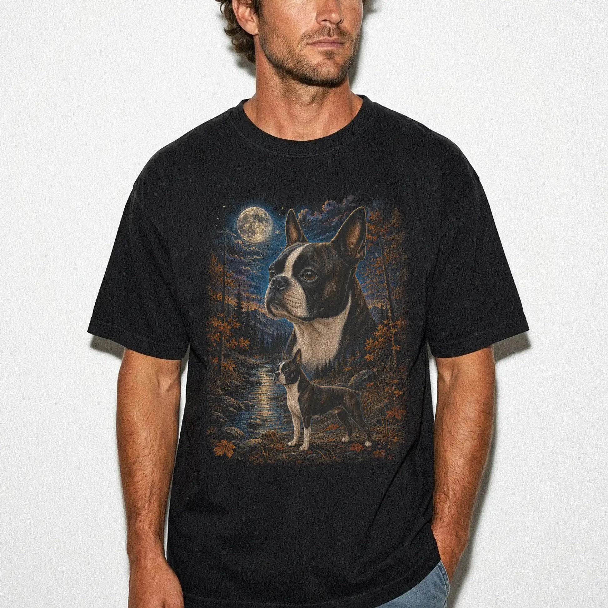 Model wearing a Black Comfort Colors® t-shirt featuring Boston Terrier in a moonlit fall forest
