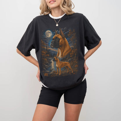Model wearing a Black Comfort Colors® t-shirt featuring Boxer in a moonlit fall forest