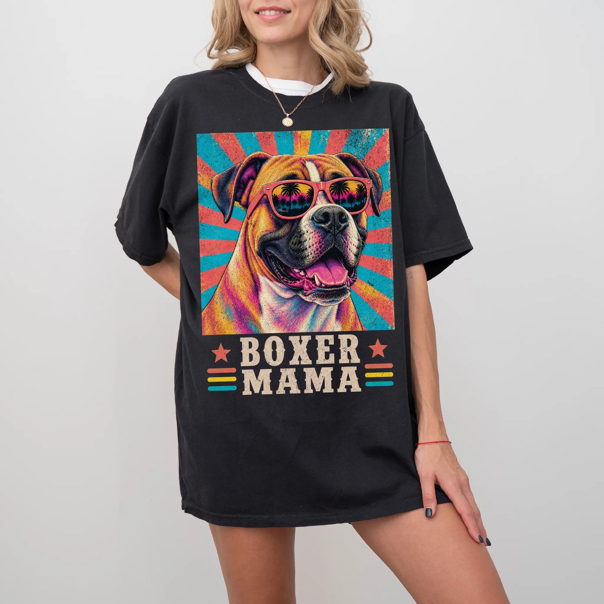 Retro Boxer Mama design on a Black Comfort Colors T-shirt worn by a model