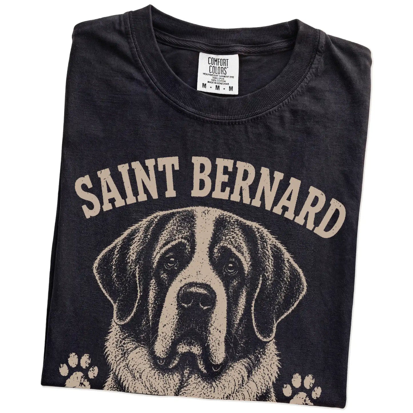Folded Black Comfort Colors® T-shirt showing Saint Bernard design with “Built To Rescue The Weekend” lettering