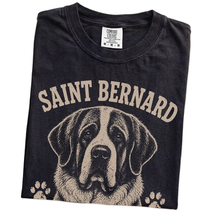 Folded Black Comfort Colors® T-shirt showing Saint Bernard design with “Built To Rescue The Weekend” lettering