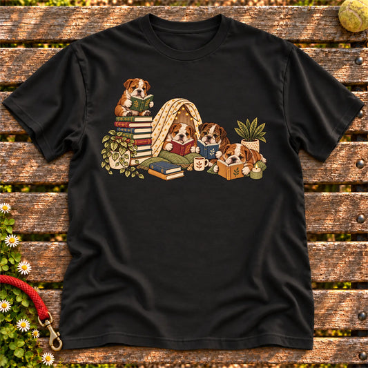 Bulldog puppies reading books in a cozy blanket fort on a Black T-shirt