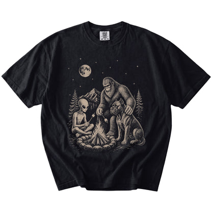 Cane Corso camping with Bigfoot and an alien on a Black Comfort Colors® T-shirt