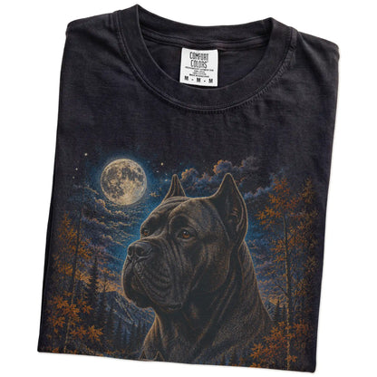 Folded Black Comfort Colors® t-shirt showing Cane Corso in a fall forest graphic