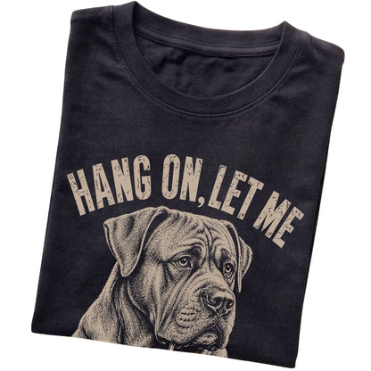 Black T-shirt featuring Overthinking Cane Corso, folded presentation