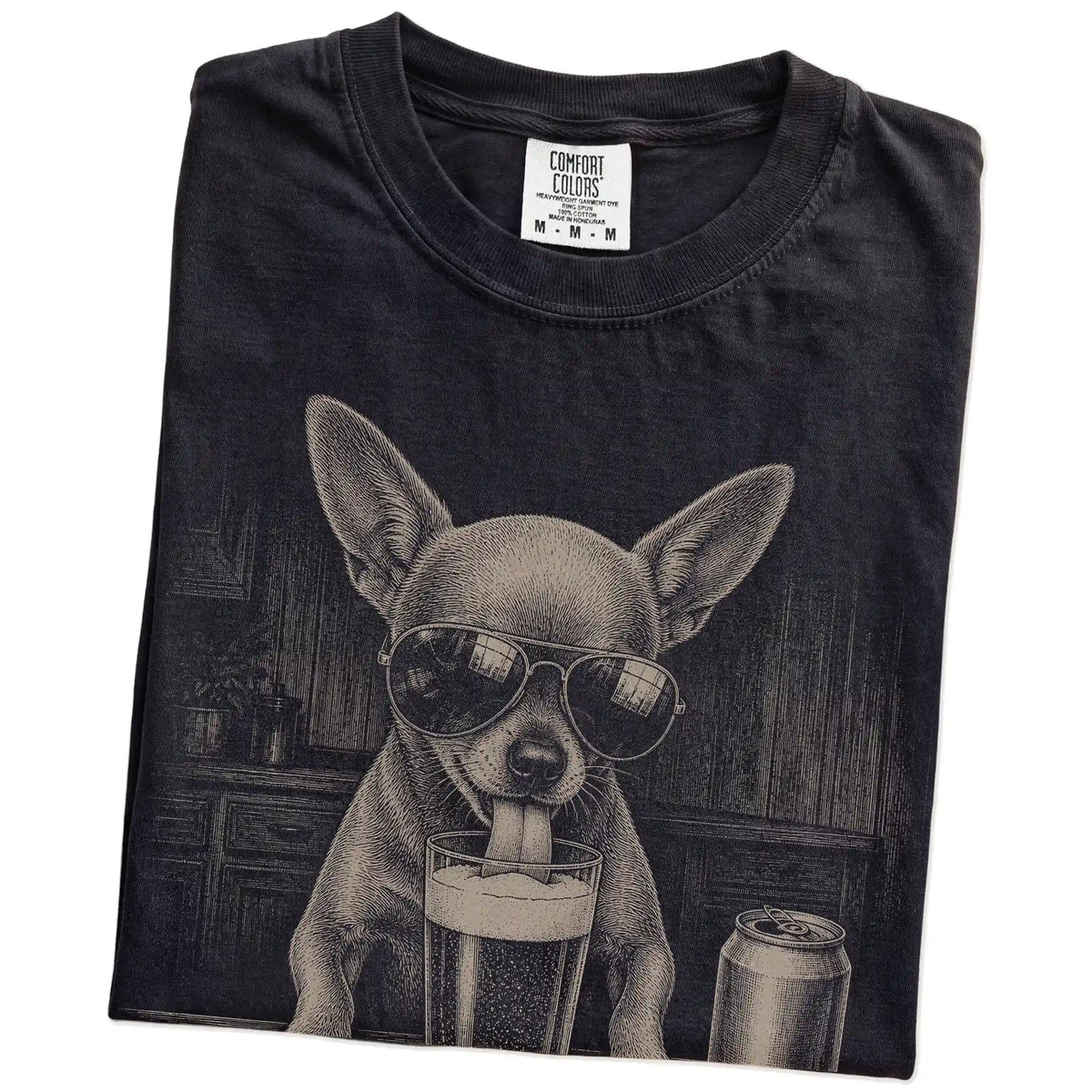Folded Black Comfort Colors® t-shirt showing Chihuahua sneaking a drink from a pint