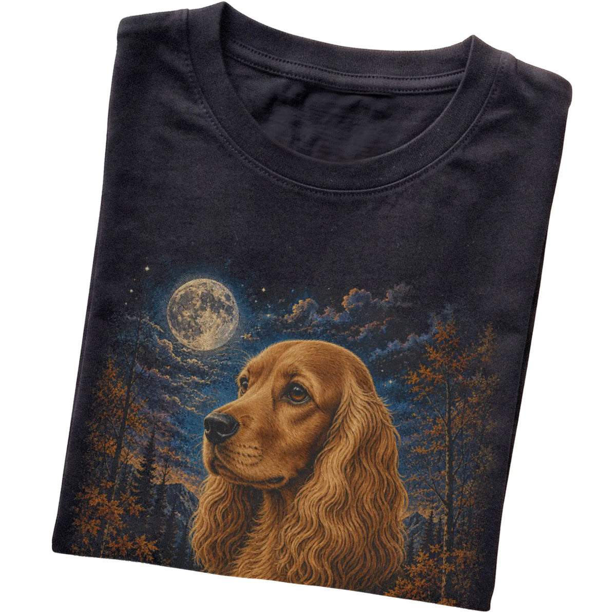 Folded black T-shirt with Cocker Spaniel Autumn Moon artwork.