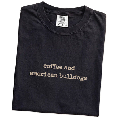 Folded Black Comfort Colors® T-shirt showing American Bulldog coffee saying