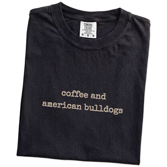 Folded Black Comfort Colors® T-shirt showing American Bulldog coffee saying