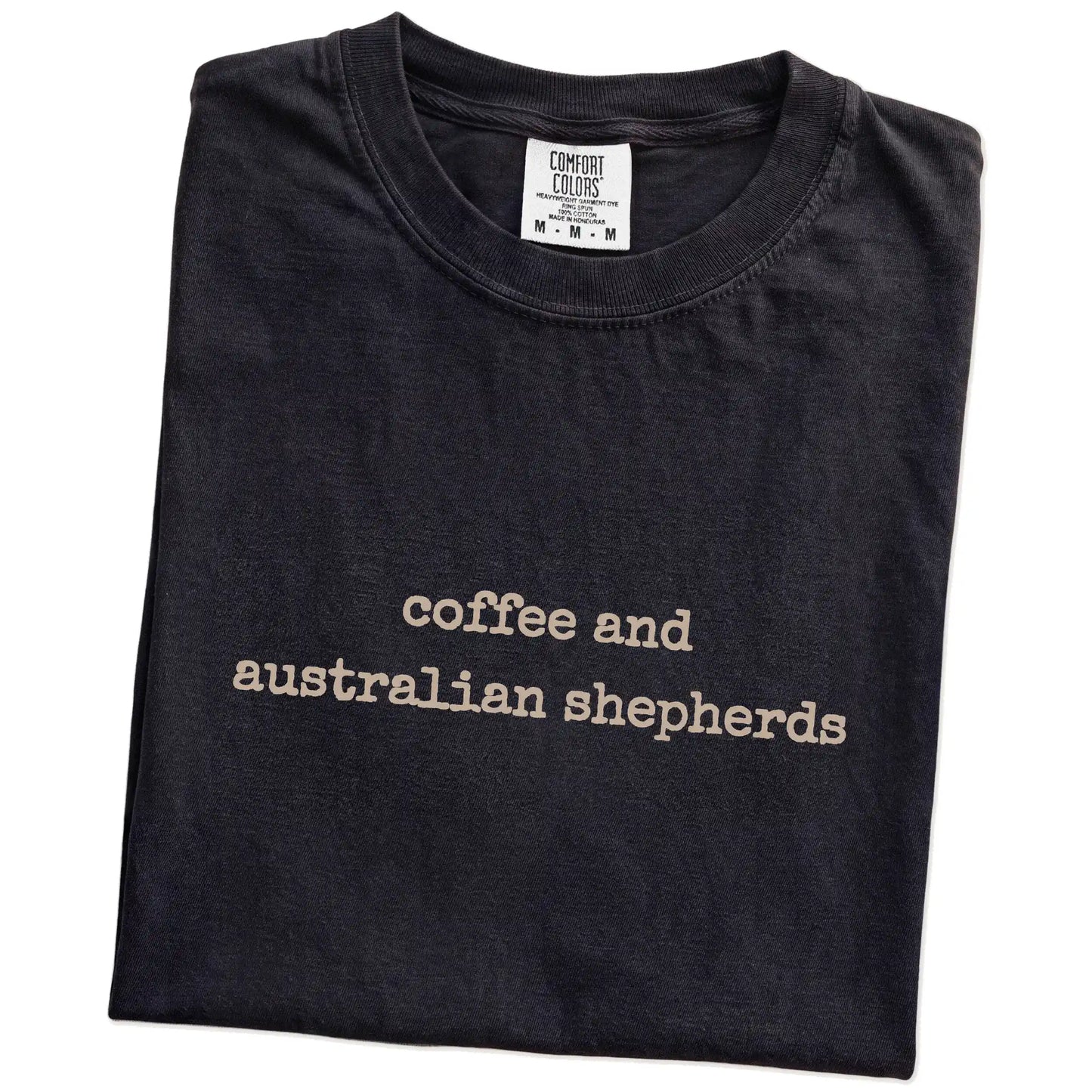 Folded Black Comfort Colors® T-shirt showing Australian Shepherd coffee saying