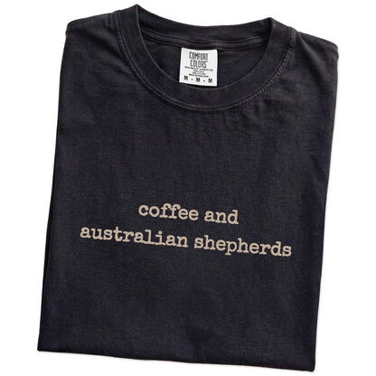 Folded Black Comfort Colors® T-shirt showing Australian Shepherd coffee saying