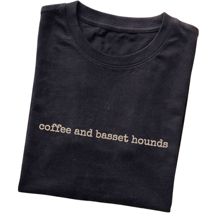 Black Coffee and Basset Hounds T-shirt folded to show the printed design