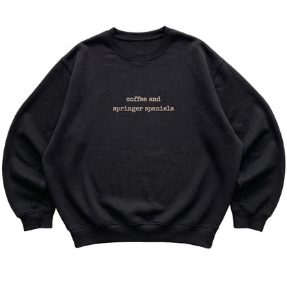 Black Coffee and Springer Spaniels sweatshirt laid flat