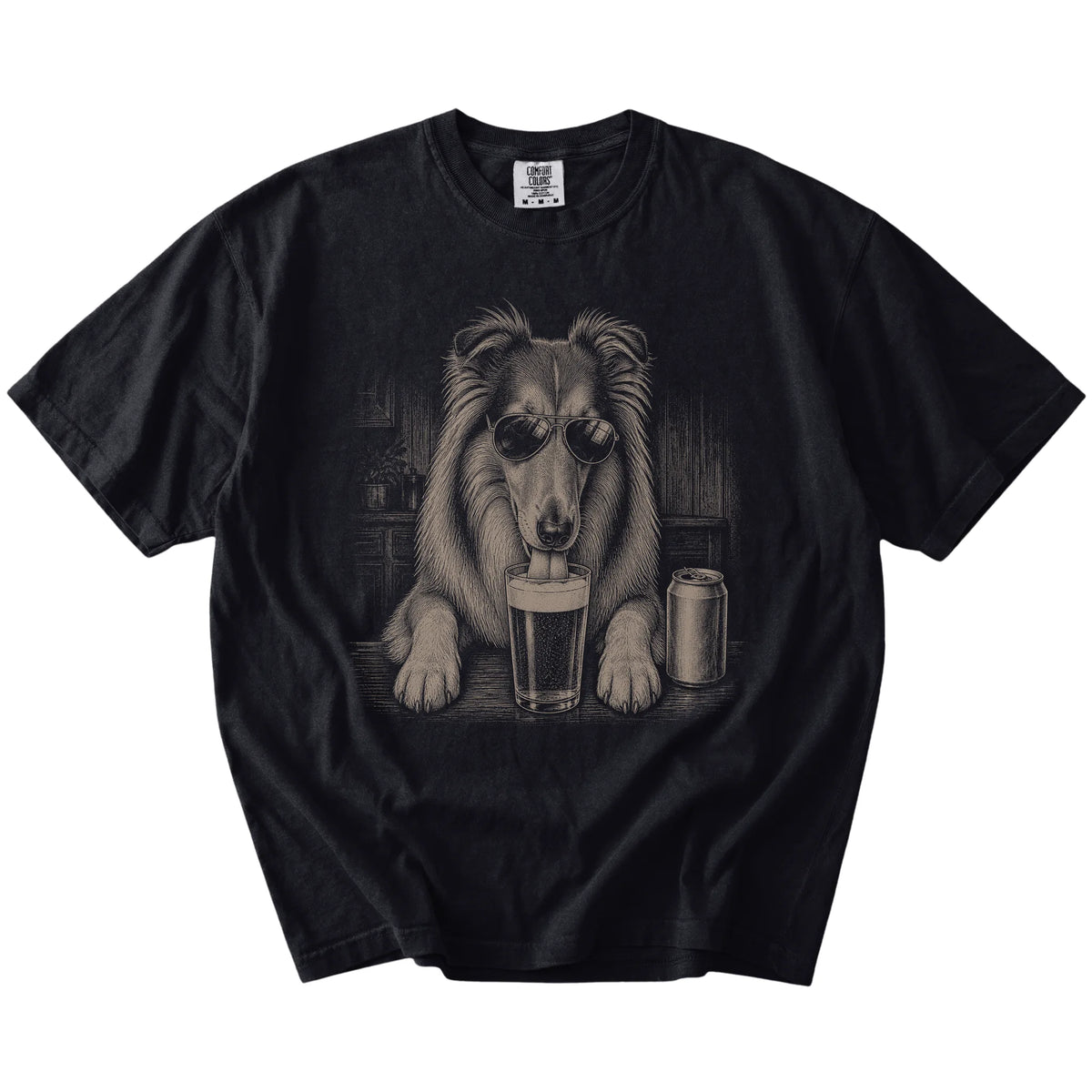Collie sneaking a drink from a foamy pint at home on a Black Comfort Colors® t-shirt