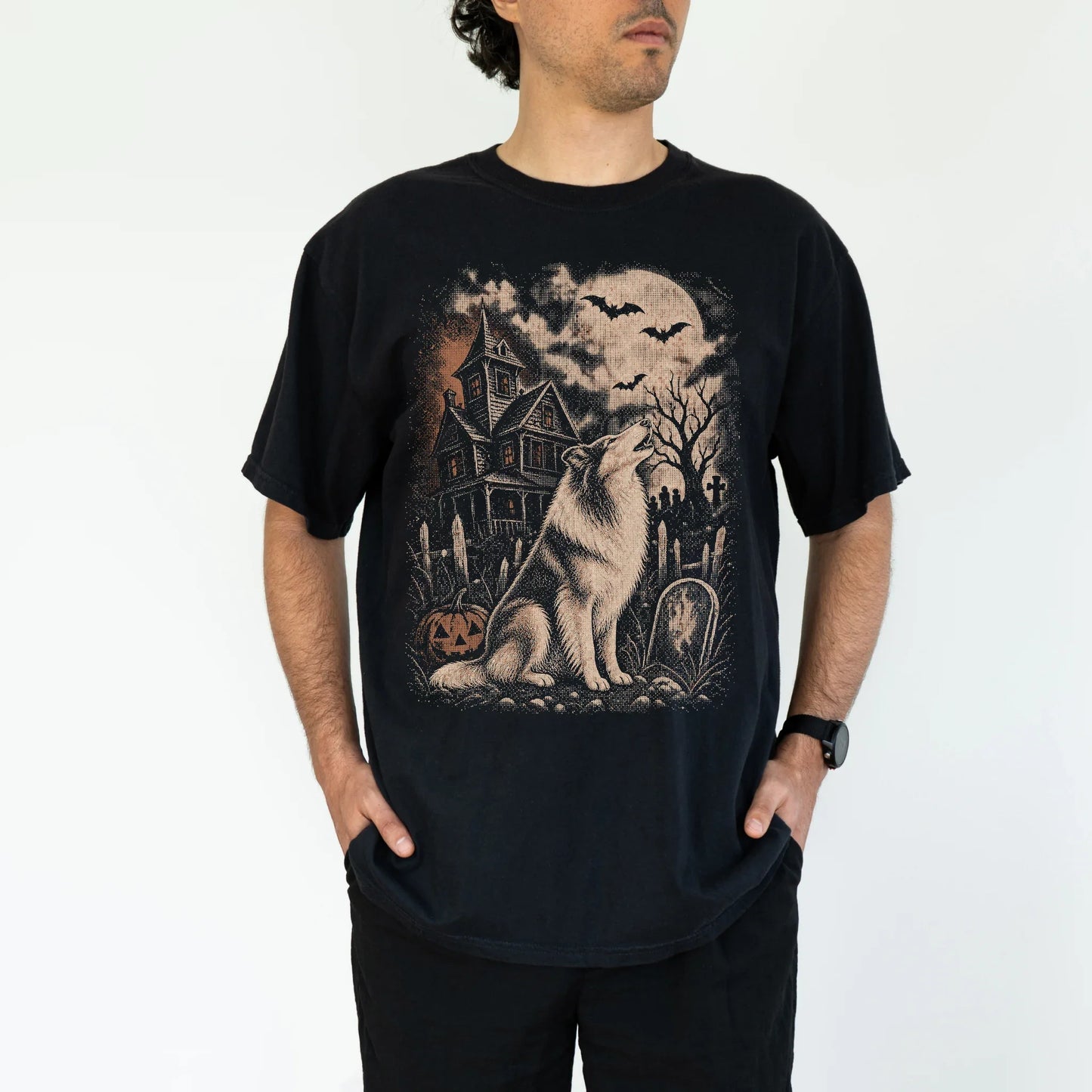 Model wearing a Black Comfort Colors® T-shirt showing Collie in a vintage haunted-house scene