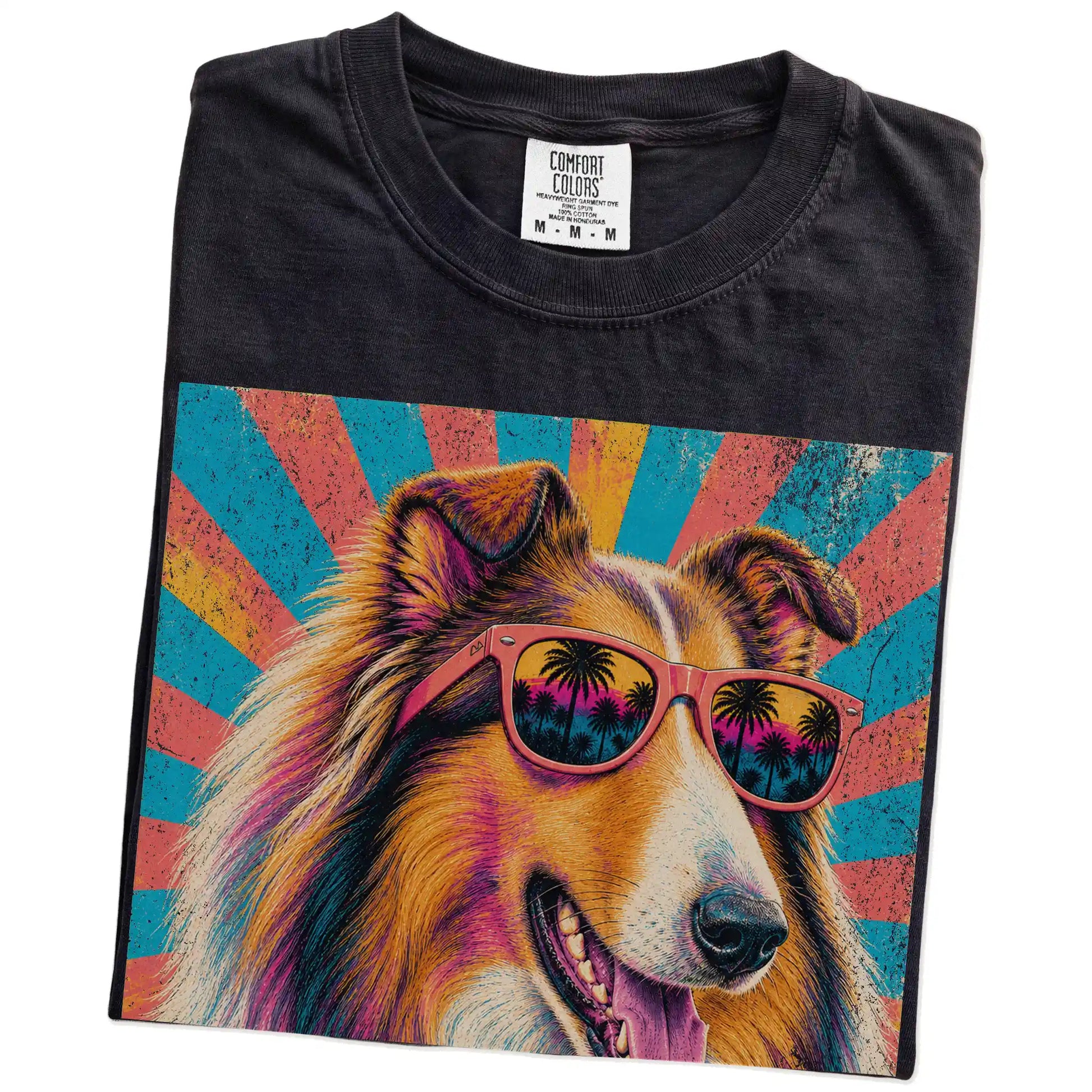 Retro Collie Mama design on a Black Comfort Colors T-shirt folded detail