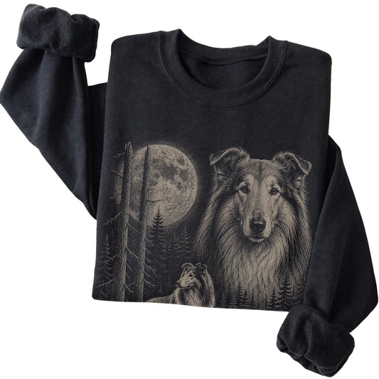 Folded black crewneck sweatshirt showing the Collie Moonlit Forest graphic