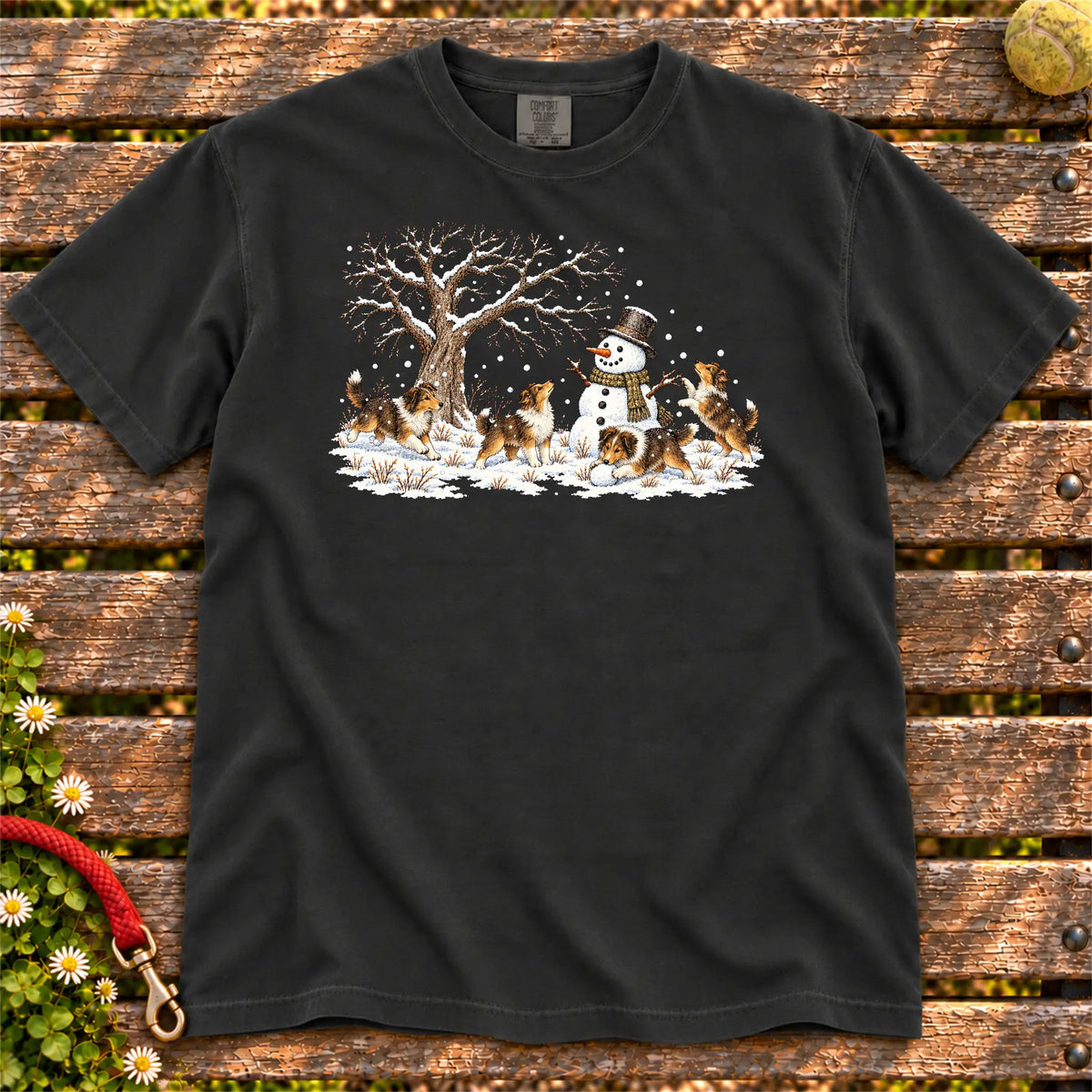 Collie puppies playing in snow with a snowman on a Black T-shirt