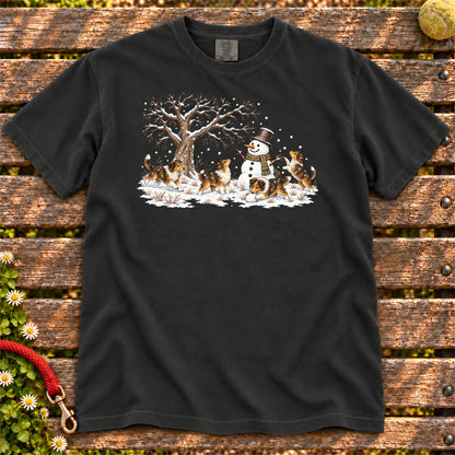 Collie puppies playing in snow with a snowman on a Black T-shirt