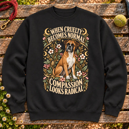 Compassion Looks Radical Boxer design on a Black Gildan sweatshirt