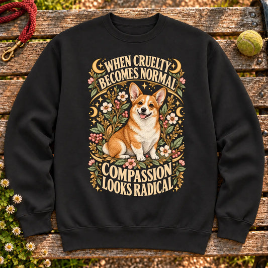 Compassion Looks Radical Corgi design on a Black Gildan sweatshirt