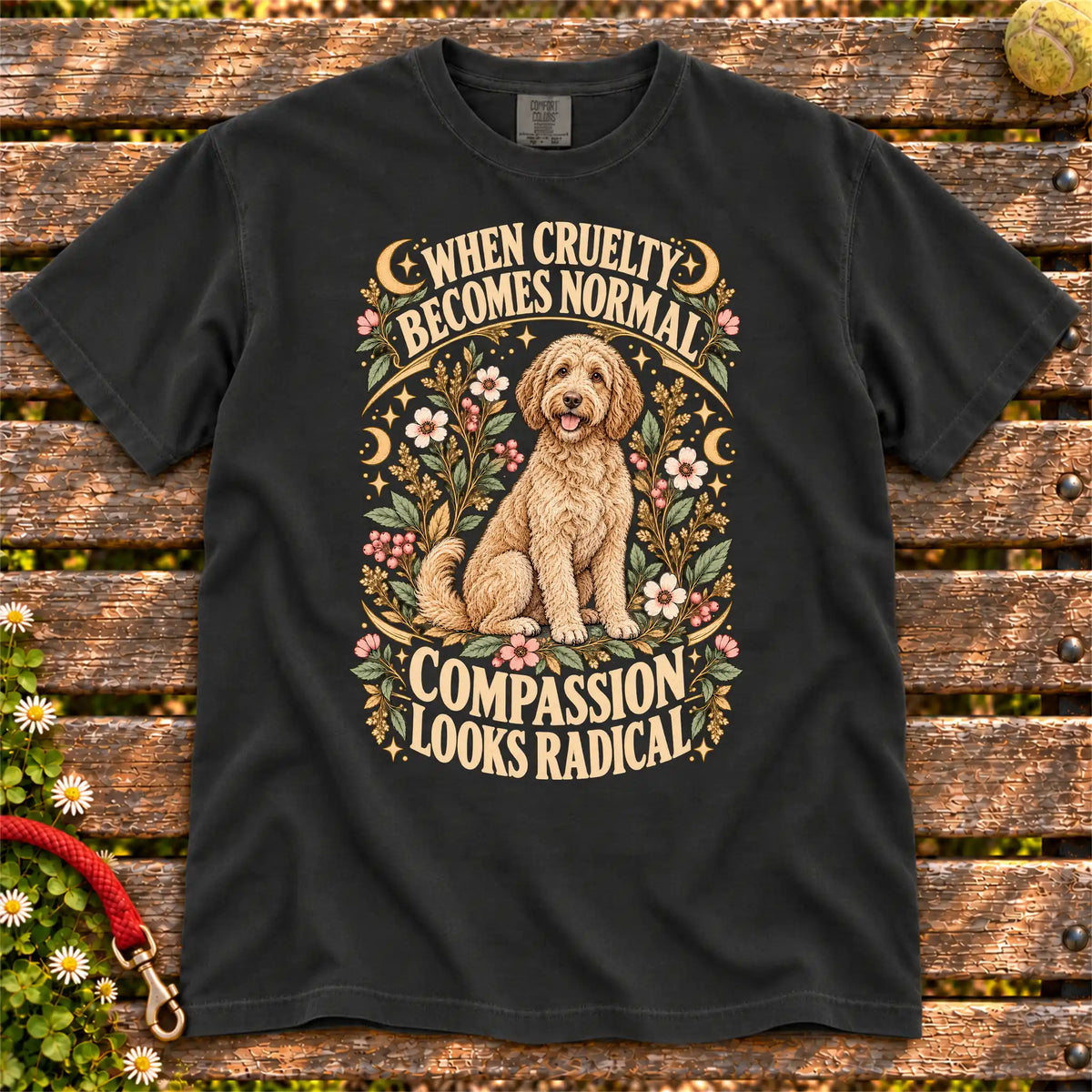 Compassion Looks Radical Labradoodle design on a Black Comfort Colors T-shirt