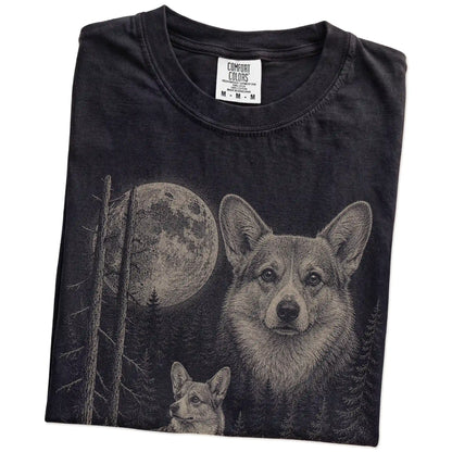 Folded Black Corgi Moonlit Forest T-Shirt showing the graphic