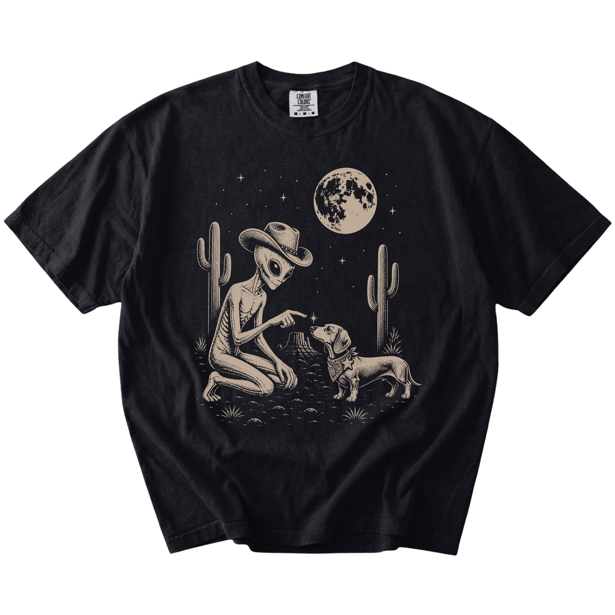 Cowboy alien fist-bumping a Dachshund beneath the moon on a Black Comfort Colors® T-shirt