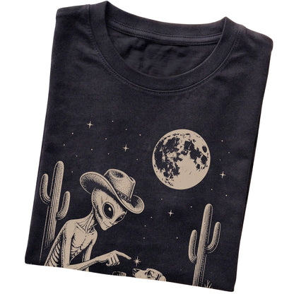 Black T-shirt featuring Dachshund Cowboy and Alien, folded presentation