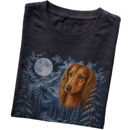 Folded black T-shirt with Dachshund Winter Moon artwork.