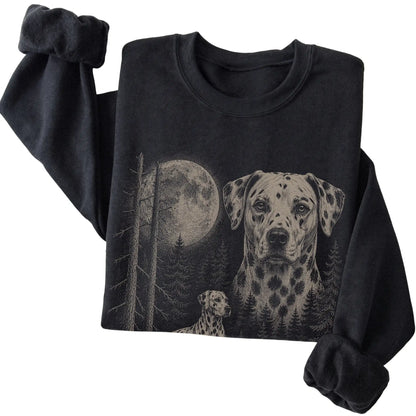 Folded black crewneck sweatshirt showing the Dalmatian Moonlit Forest graphic