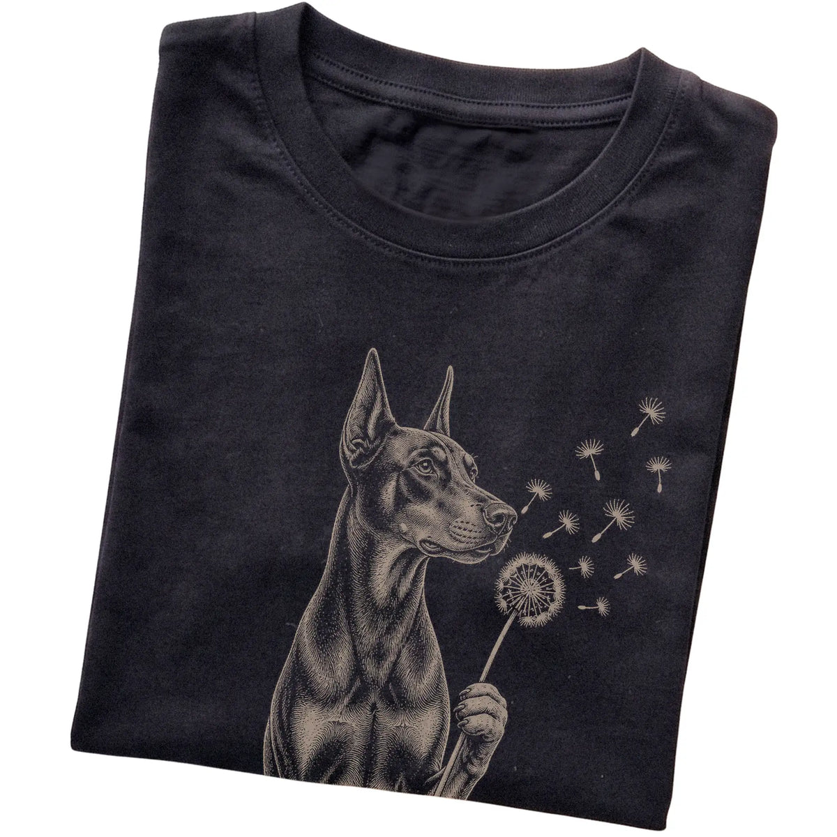 Black T-shirt featuring Dandelion Doberman, folded presentation