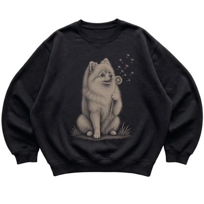 Black crewneck sweatshirt featuring Dandelion Pomeranian, laid-flat presentation
