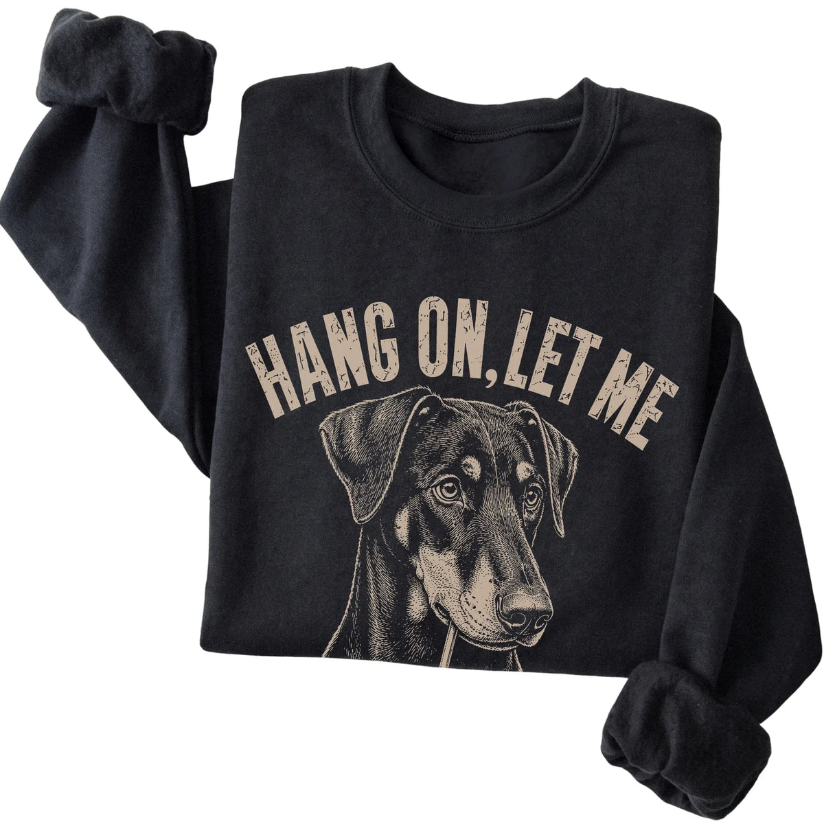 Black crewneck sweatshirt featuring Overthinking Doberman, folded presentation
