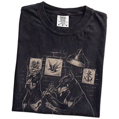Folded Black Doberman Tattoo t-shirt showing the graphic