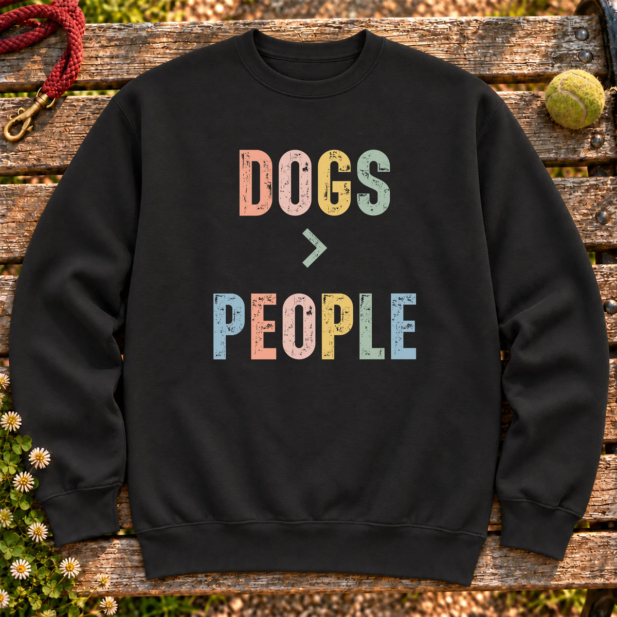 Dogss greater than people text design on a Black crewneck sweatshirt