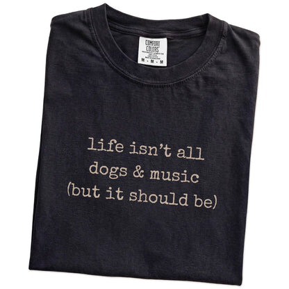 Folded Black Comfort Colors® T-shirt showing dog-themed music graphic