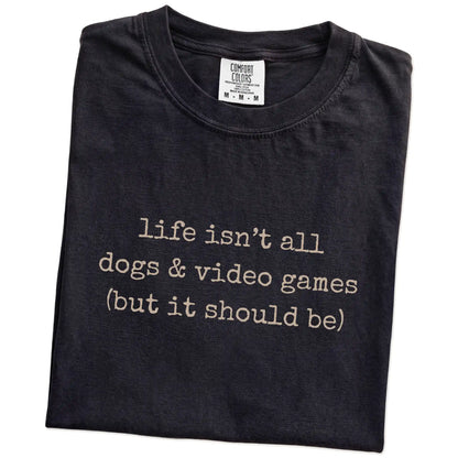 Folded Black Comfort Colors® T-shirt showing dog-themed video games graphic