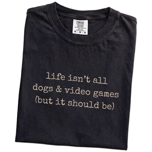 Folded Black Comfort Colors® T-shirt showing dog-themed video games graphic