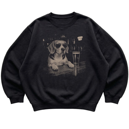 Black Beagle at a bar beside a pint, laid flat