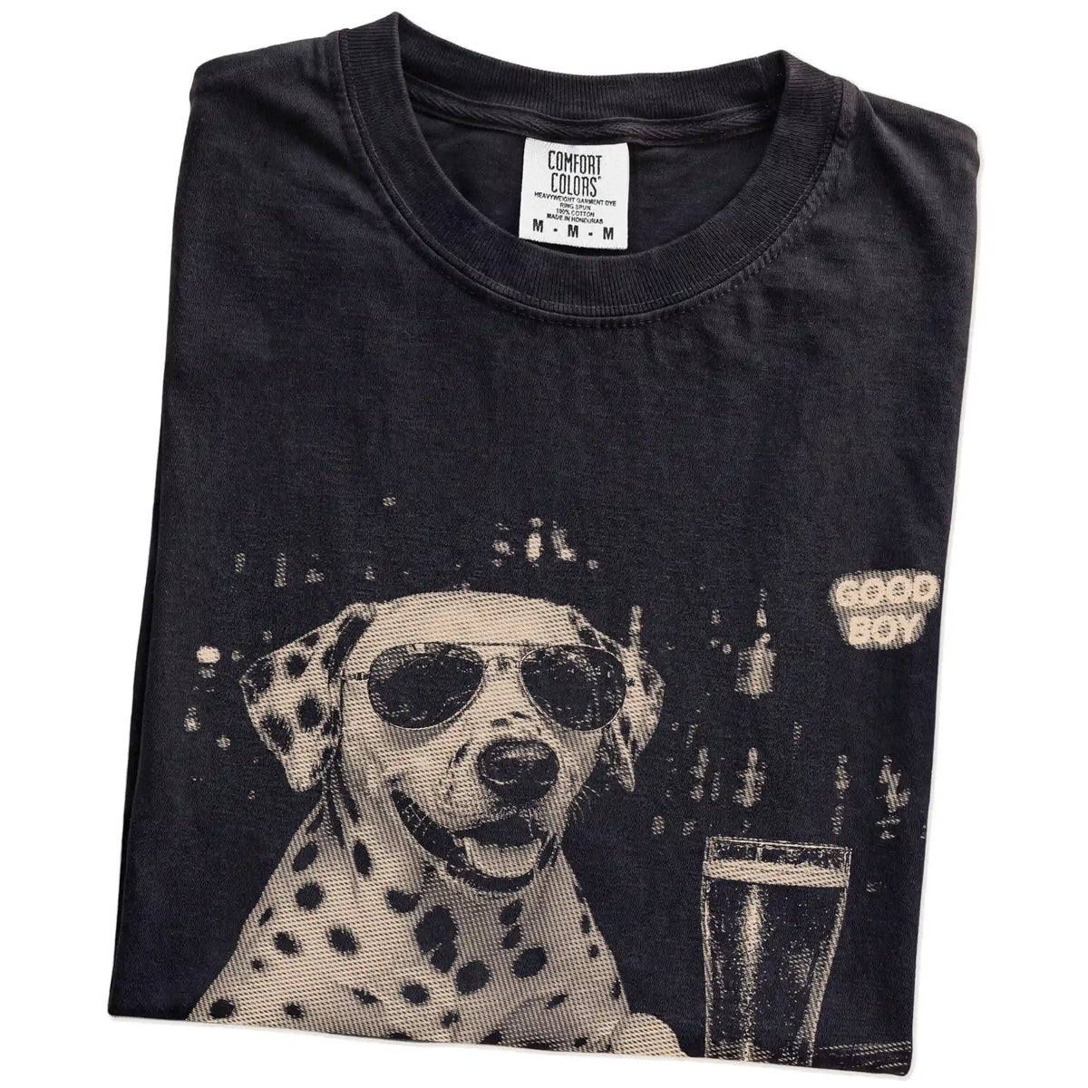 Black Dalmatian at a bar beside a pint, folded detail view
