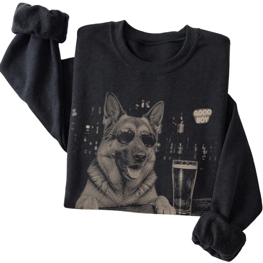 Black German Shepherd at a bar beside a pint, folded detail view