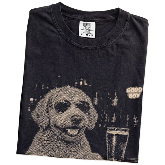 Black Labradoodle at a bar beside a pint, folded detail view