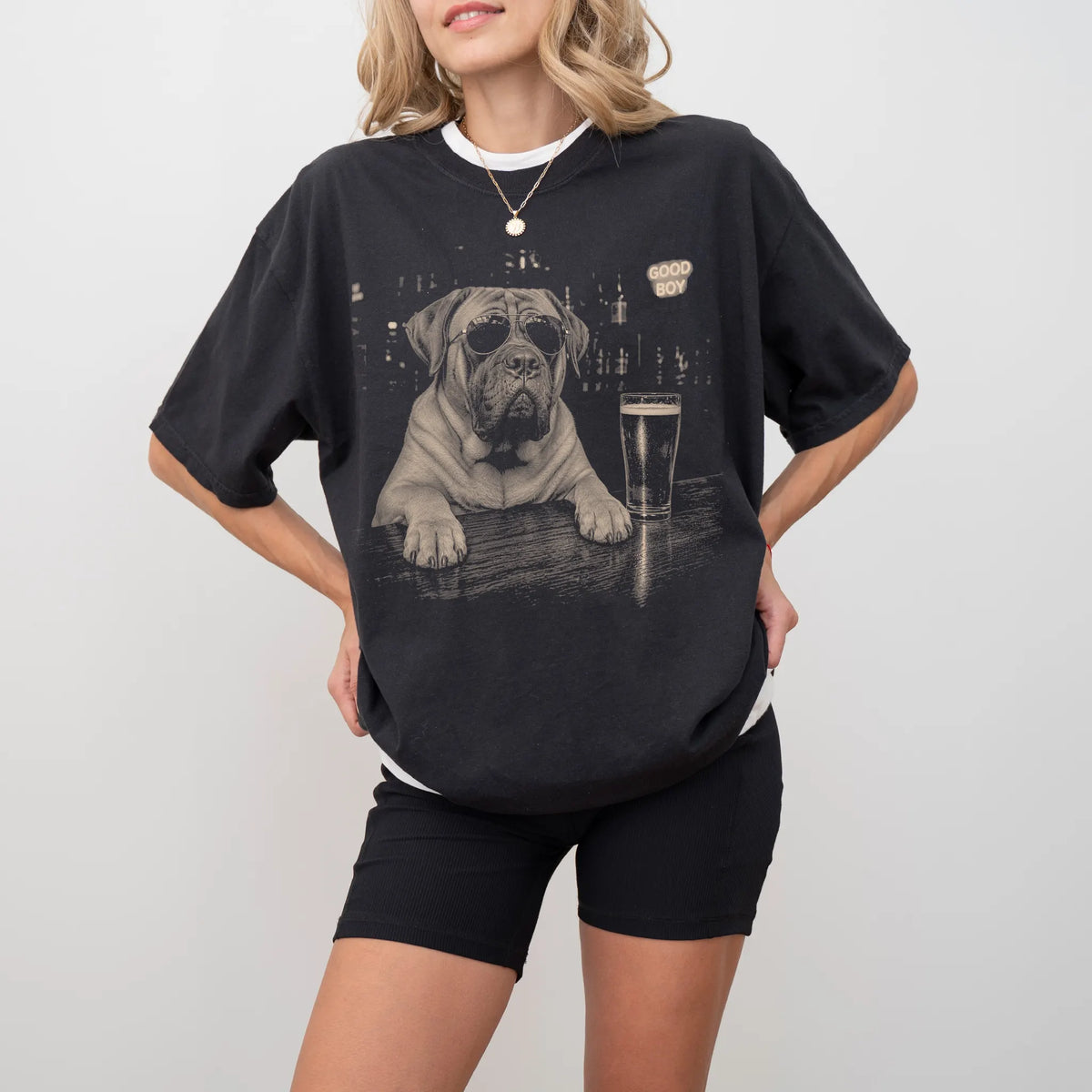 Black Mastiff at a bar beside a pint, worn in a studio setting