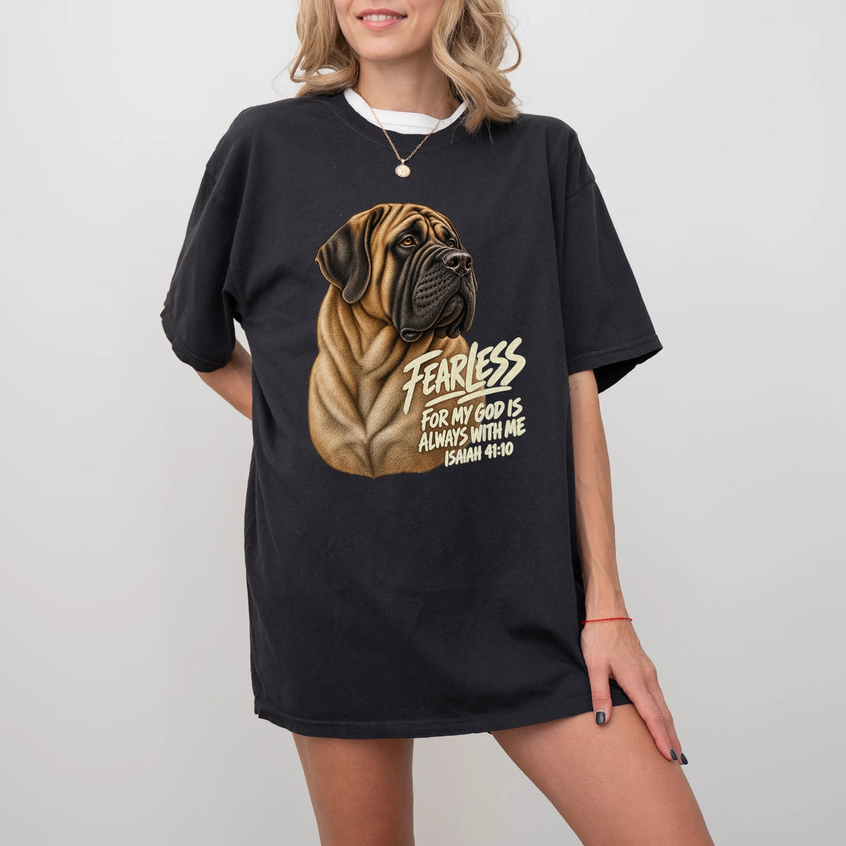 Woman wearing a black Fearless Mastiff T-shirt with Isaiah 41:10