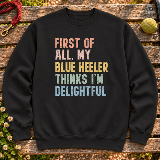 “First of all, my Blue Heeler thinks I’m delightful” text on a Black sweatshirt